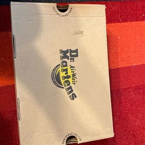 Brand new Dr. Martens fur lined boots